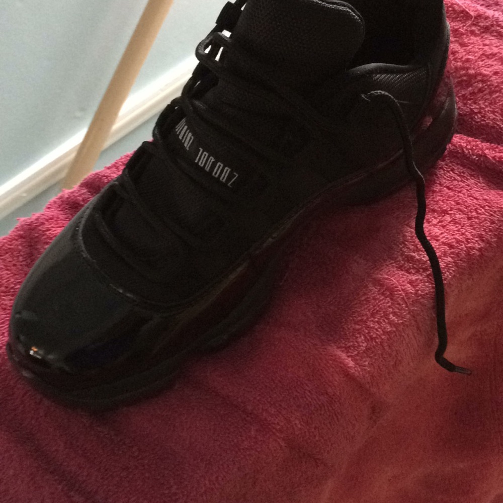 All black Jordan 11s